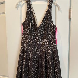 Black v-neck dress by Betsey Johnson